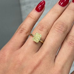 GIA certified natural yellow canary elongated diamond.