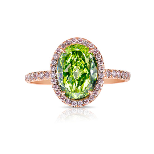 Oval cut diamond, natural green diamond, unique green diamond engagement ring in pink diamond halo.