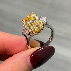 Radiant yellow diamond ring