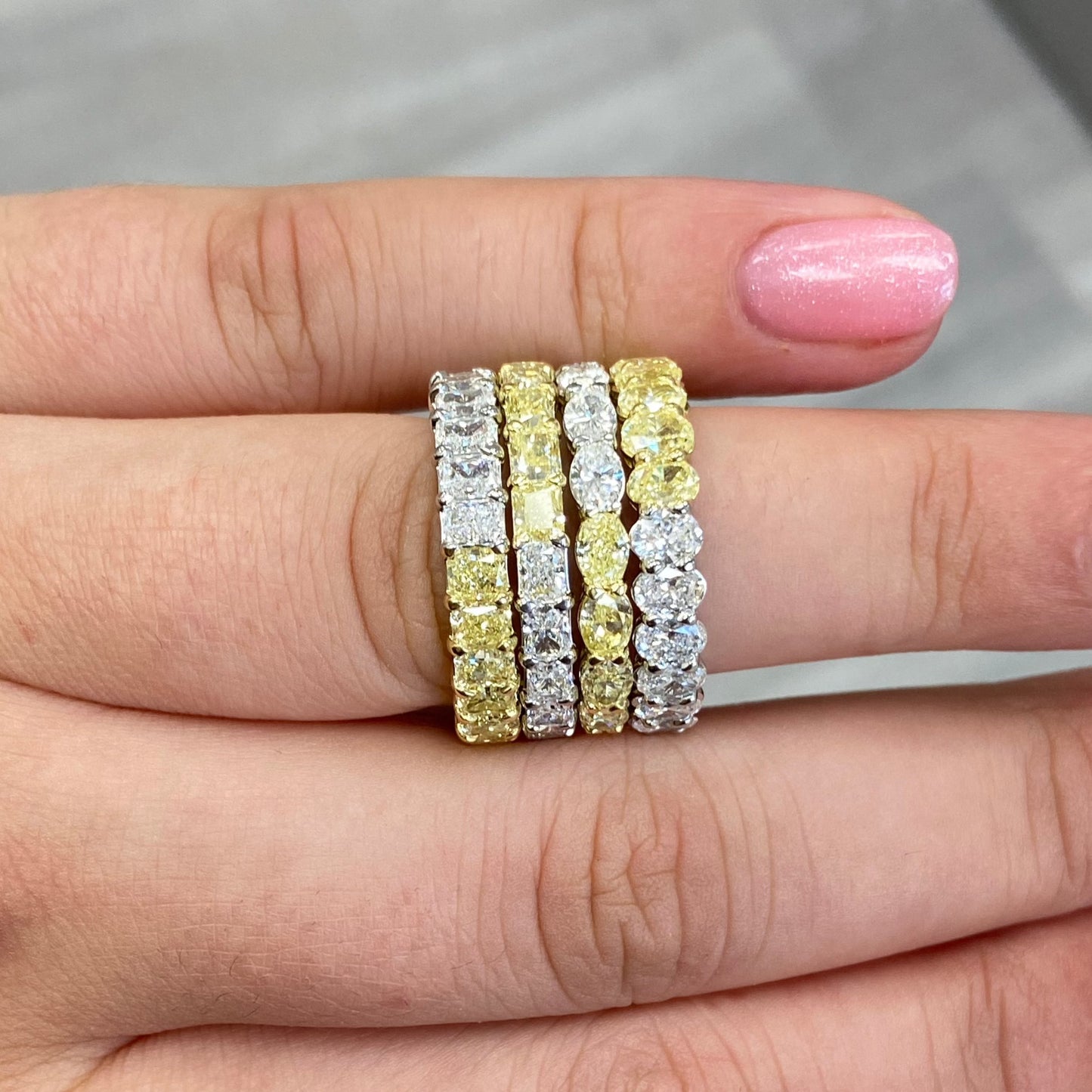Wear two ways diamond eternity band. Undecided eternity ring. Diamond eternity ring. Fancy yellow and white alternating eternity band. Alternating diamond ring.