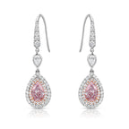 Natural pink diamond earrings, surrounded by a double halo or natural white diamonds, handmade by color diamond experts in new york