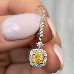 Natural canary diamond earrings in halo design