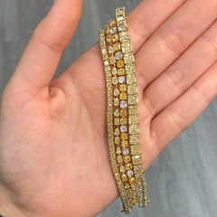 Fancy intense yellow diamond tennis bracelet with natural canary diamonds