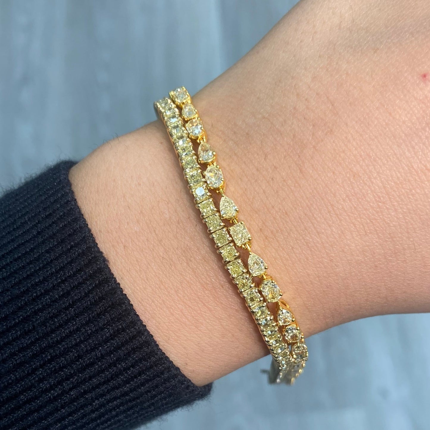 Fancy intense yellow diamond tennis bracelet with natural canary diamonds