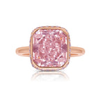 Elegant bezel set ring featuring a GIA certified very light pink cushion cut diamond.