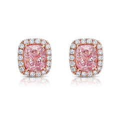 Pink diamond earrings. pink diamond studs. light pink diamonds. light pink cushions. diamond earrings.