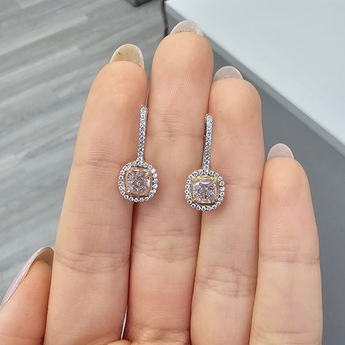 Light pink diamond cushion earrings. Natural pink diamonds. Gia certified pink diamonds. Pink diamond earrings. Pink diamond jewelry. Fancy pink diamonds.