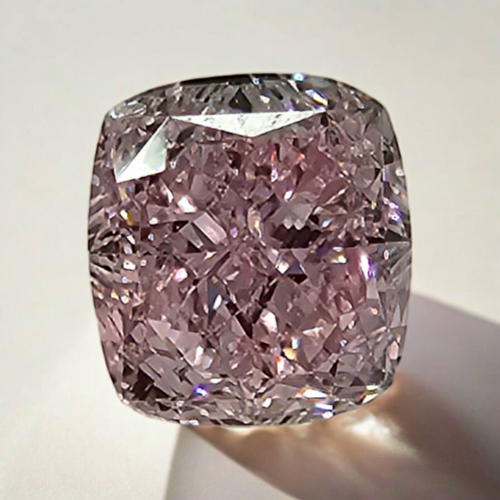 Luxurious GIA certified purplish pink cushion cut diamond with exceptional VVS1 clarity.