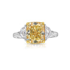 3 Carat Fancy Yellow VVS1 Cushion Diamond 3 Stone Ring, unique engagement ring style.