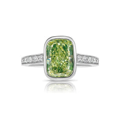 GIA certified natural greenish yellow diamond engagement ring with elongated cushion cut center diamond and VS2 clarity.