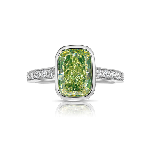 GIA certified natural greenish yellow diamond engagement ring with elongated cushion cut center diamond and VS2 clarity.