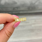 Natural half eternity band featuring radiant fancy yellow diamonds in a timeless design.