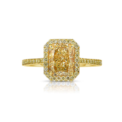 All yellow diamond radiant cut halo engagement ring.