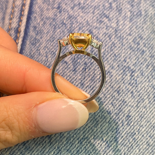 A unique GIA certified ring with Elongated fancy yellow diamond ring.