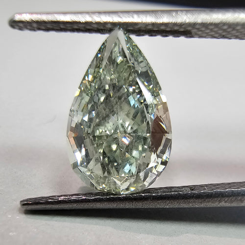 1.89 Carat Pear Shape Diamond Fancy Yellow-Green VS2 Clarity, GIA certified natural green diamond.