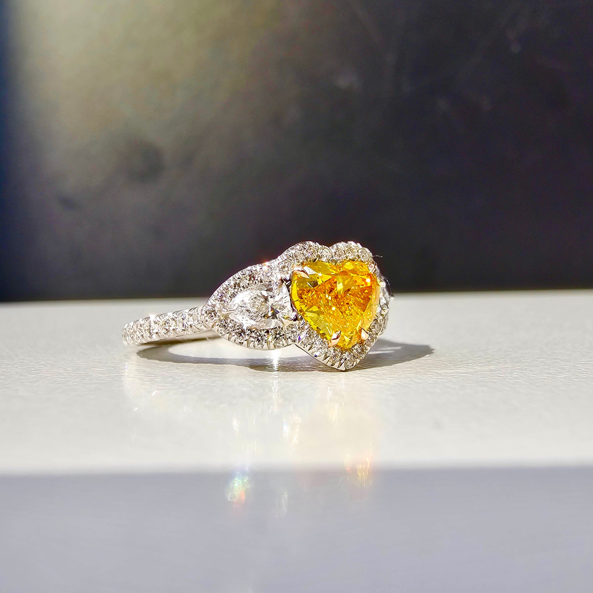 Natural vivid orangey yellow heart shape diamond ring