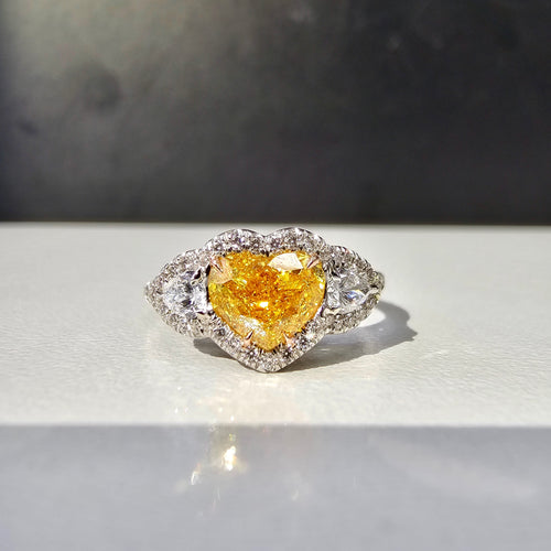 Natural vivid orangey yellow heart shape diamond ring