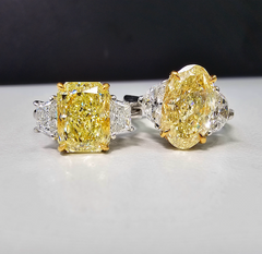 3ct Fancy Light Yellow Oval Three Stone Diamond Ring, a canary oval diamond!