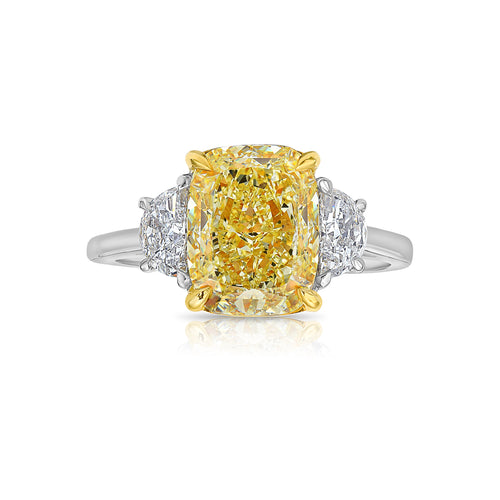 Fancy yellow cushion diamond engagement ring featuring a GIA certified cushion cut diamond.