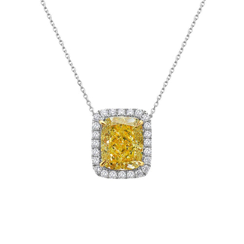 Natural fancy light yellow cushion cut diamond in a white diamond halo on a 18k gold pendant