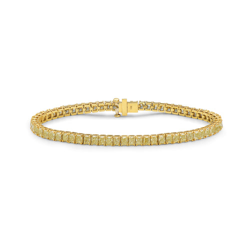 Elegant bracelet featuring fancy yellow cushion diamonds in a natural yellow diamond jewelry design.