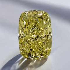 Vivid yellow elongated cushion-cut diamond GIA certified .