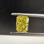 1.02 Carat Elongated Radiant Cut Diamond  GIA Certified Diamond  Fancy Intense Yellow VVS1 Clarity.