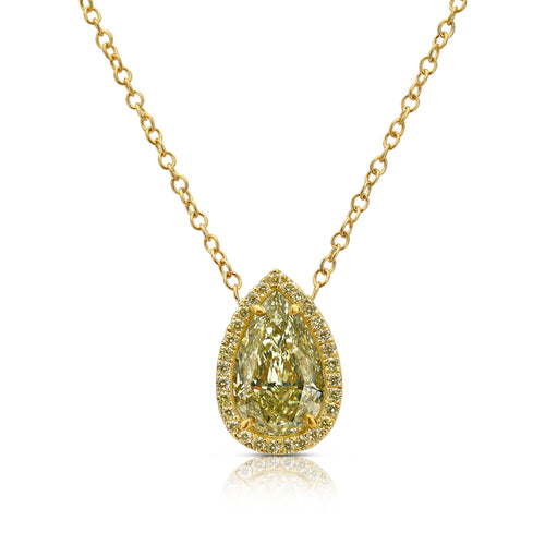 2.5 carat yellow diamond pear shape set in 18 karat yellow gold pendant with yellow diamond round  halo.