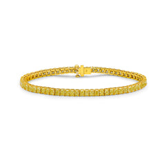 Fancy yellow diamond elongated radiant cut bracelet. Cushion diamond bracelet. radiant tennis bracelet. Yellow diamond jewelry. Yellow tennis bracelet. Natural yellow diamond jewelry.