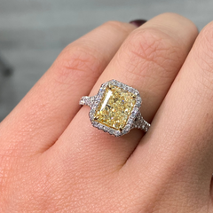 Yellow diamond ring with White Halo diamonds