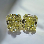 matched pair of natural fancy light yellow cushion cut diamonds 