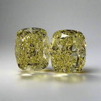 matched pair of natural fancy light yellow cushion cut diamonds 