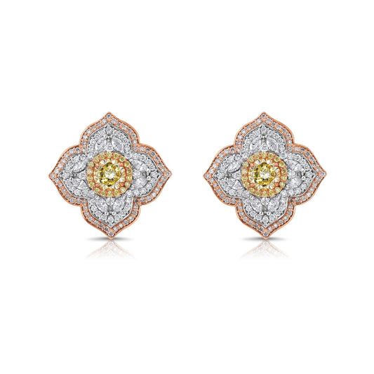 Light yellow and fancy light yellow diamond studs, in a flower theme with 1.5 carats of surrounding white and yellow diamonds