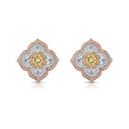 Light yellow and fancy light yellow diamond studs, in a flower theme with 1.5 carats of surrounding white and yellow diamonds