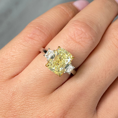 yellow diamond engagement ring with elongated cushion cut diamond