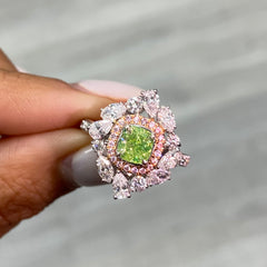 Fancy green diamond ring surrounded by pink and white natural diamonds in a reversible ring and pendant.