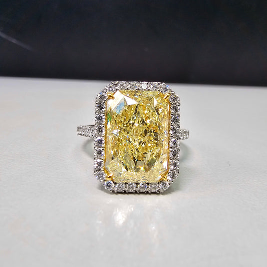 5ct Yellow Elongated Radiant canary diamond  Halo Diamond Ring with an elongated radiant cut canary yellow diamond