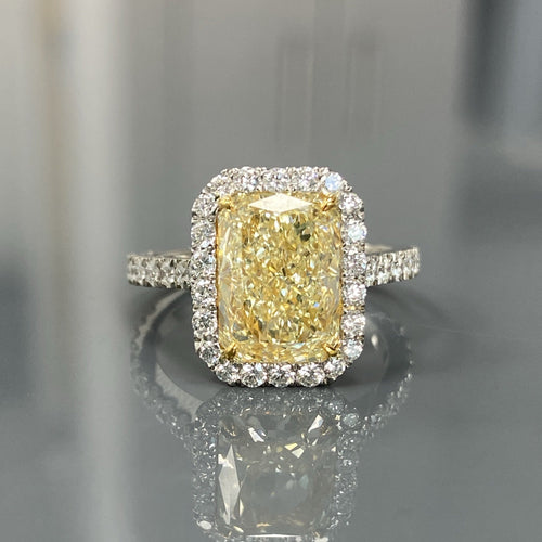 Fancy light yellow diamond. long radiant yellow diamond. long radiant, GIA certified.