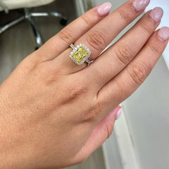 3ct Fancy Yellow Cushion Halo Diamond Ring with a canary yellow diamond