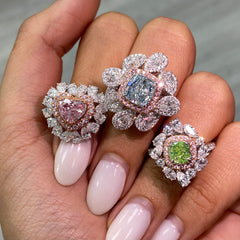 Fancy green diamond ring surrounded by pink and white natural diamonds in a reversible ring and pendant.