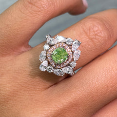 Fancy green diamond ring surrounded by pink and white natural diamonds in a reversible ring and pendant.