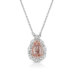 Unique natural pink diamond pendant featuring a pear shaped gem with a delicate hue.