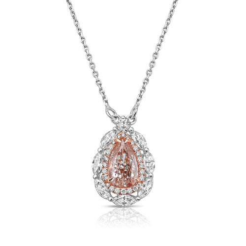 Unique natural pink diamond pendant featuring a pear shaped gem with a delicate hue.