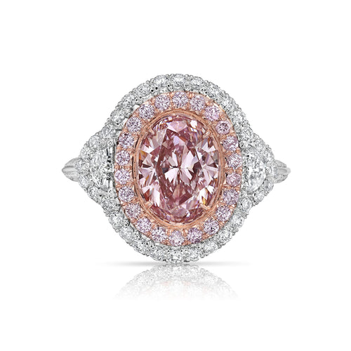 Ethereal natural pink oval diamond ring with a stunning halo design with SI1 clarity.