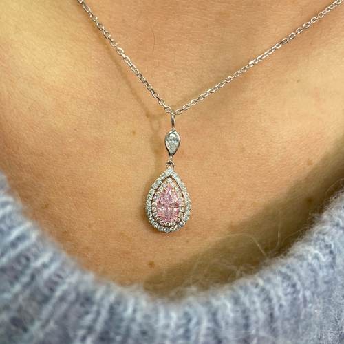 Pink diamond necklace with a pear-shaped pink diamond and double halo on a delicate chain with a VS2 clarity.