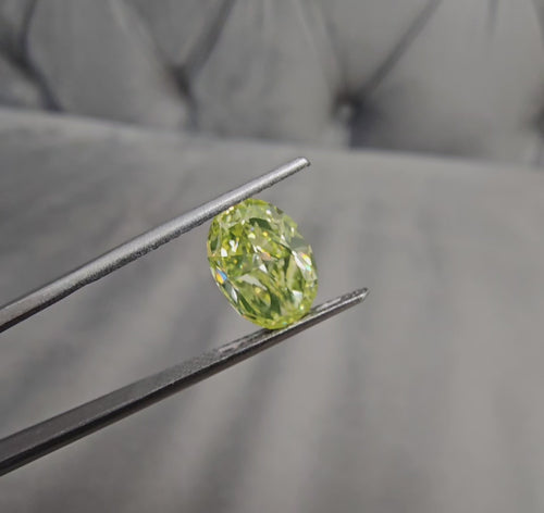 2.43 Carats Total Fancy Intense Green-Yellow Oval Diamond VS1 Clarity " Strong Green Fluorescence" Giving it the desired NEON green color  GIA Certified Diamond 