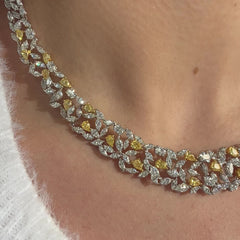 23.14 Total Carat Weight 4.78 Carats of Yellow Pear Shapes 18.36 Carats of White Marquise Cuts and Oval Diamonds One of A Kind Piece Handcrafted in NYC