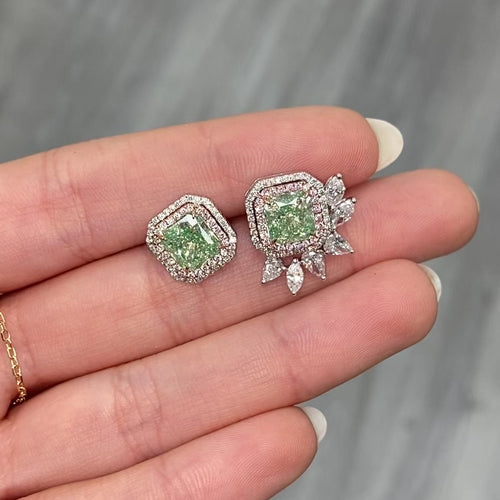 Unique green diamond stud earrings surrounded by natural pink and white diamond halos.