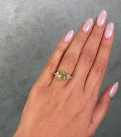 4 Carat Step Cut Pear Shape Champagne Diamond Three Stone Ring