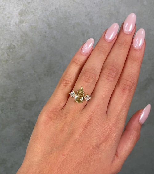 4 Carat Step Cut Pear Shape Champagne Diamond Three Stone Ring